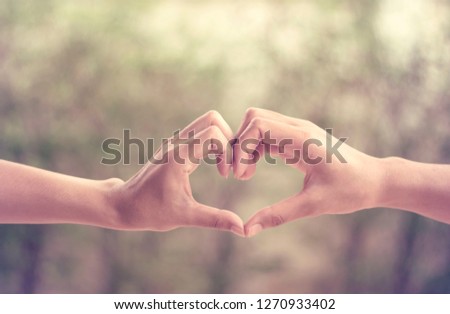 hands in shape of love heart vintage