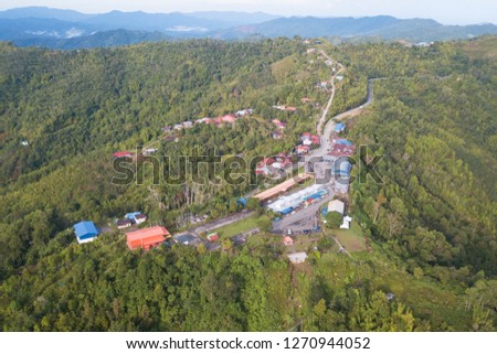 Rural road bulit on top of hill ridges in Sabah Malaysian Borneo.