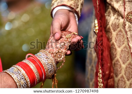 Bride & Groom Hand' Together in Indian Wedding