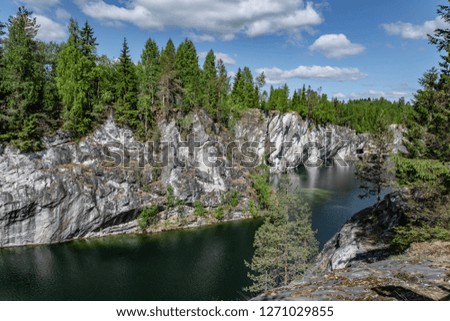 Ruskeala Mountain Park - a centuries-old history of mining. The indescribable beauty of natural marble in the wild. Karelia. Russia.