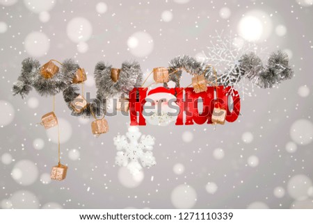 "HO HO HO text" ,christmas decoration ,snowing