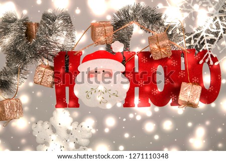 "HO HO HO text" ,christmas decoration ,snowing