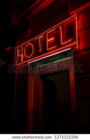 
Hotel facade with neon light