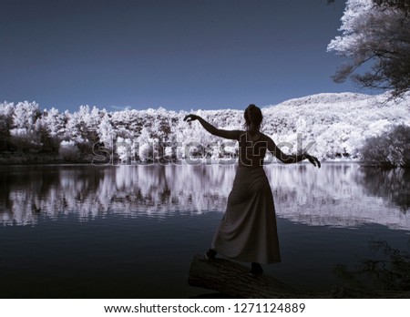 woman silhouette on the lake 720nm infrared photo