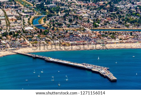 The aerial view of the city of Santa Cruz with its beach in Northern California on a sunny day.