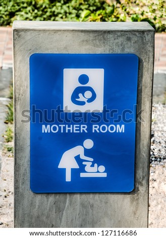 Sign of mother and baby changing