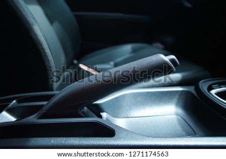 Close up of Car Parking Brake, Car Hand Brake on low light 