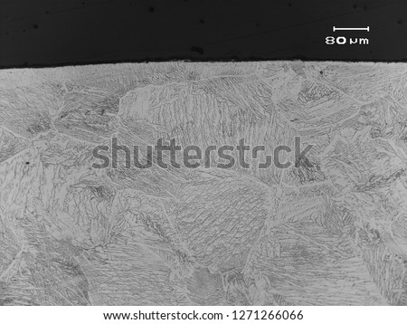 Micrograph  of microstructure of austenitic stainless steel weld type 309. Royalty-Free Stock Photo #1271266066