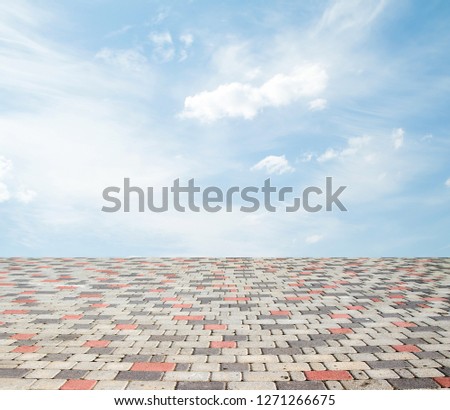 paving stones against the sky with clouds