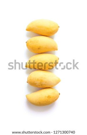 Whole mangoes isolated white background. Top view flat lay