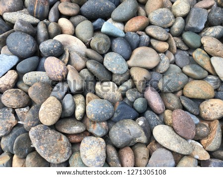 Rough Pebble stone or terrazzo background texture 