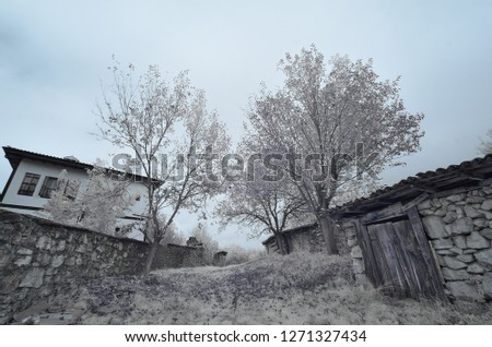 old greek house in a old turkish vilage with snowy foliage 720nm infrared photo