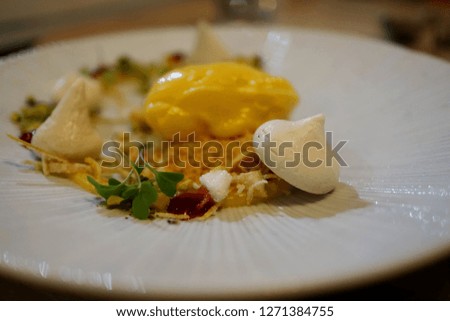 Deconstructed Citrus Meringue Tart with Raspberry Coulis, Crumble and Candied Zest