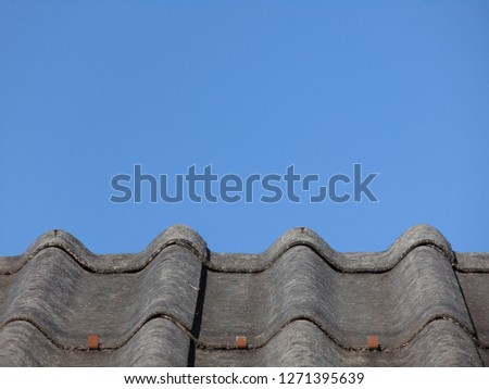 The roof and bright blue sky used as a background 