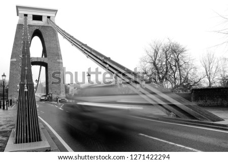 car on bristol suspension bridge