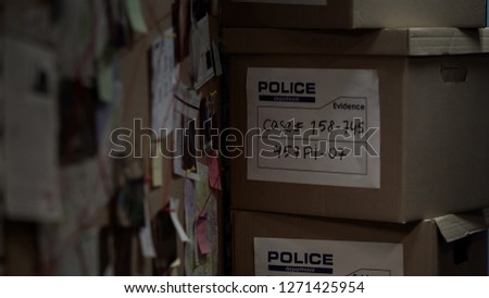 Boxes with evidential materials at police office, investigation process, case