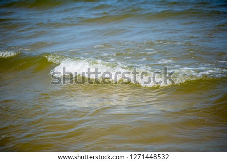 Sea Waves breaking on shore. Baltic Sea waves in close up.