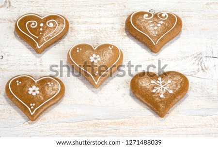 Homemade gingerbread cookies on a wooden table