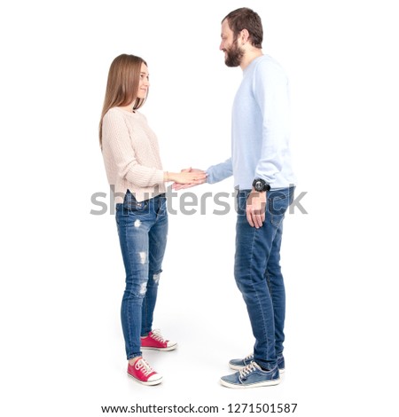 Beautiful woman gives hand to man on white background isolation