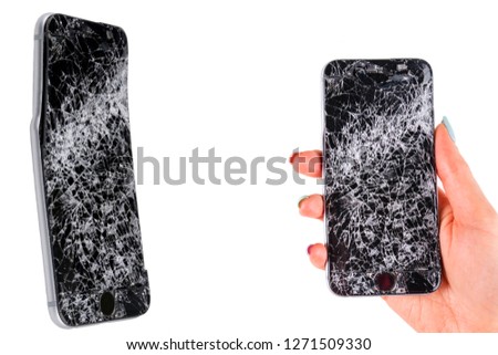 Woman hand holding two modern mobile smartphone broken screen and damages. Cellphone crashed and scratch. Device destroyed. Smash gadget, need repair. Isolated on white background