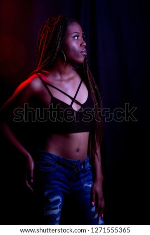 African American woman with Red and Blue studio lights