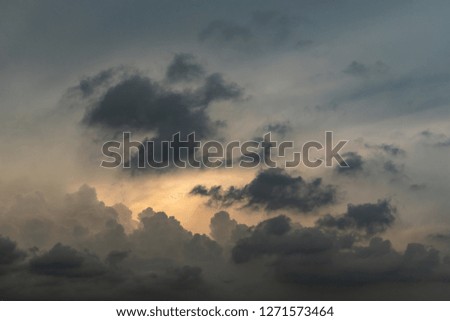 Grey and gold evening cloud formation background