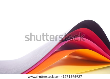 Color paper sheets on white background