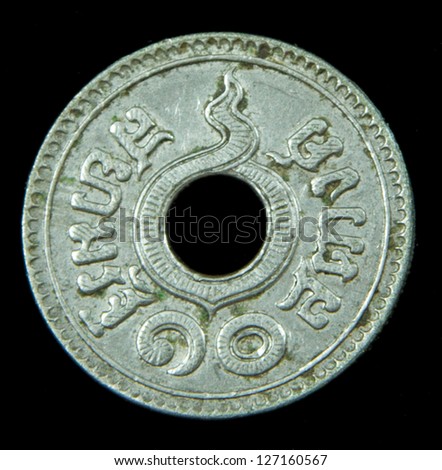 Old coin Thailand, which is obsolete today on black back ground