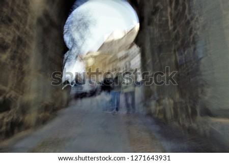Tribute to Monet, tribute to Ernst Hass, impressionist photograph of Sun Gate, Tourists, Toledo, Spain, photographic sweeps at low shutter speed, blurred background, motion sensation,  