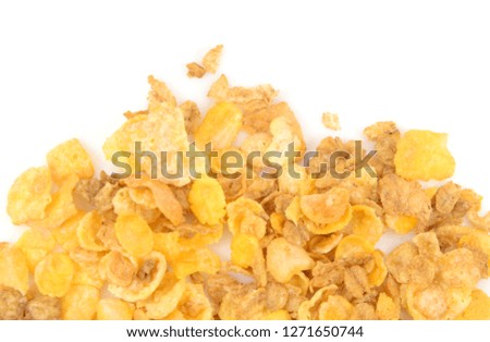 Corn flakes and honey on white background
