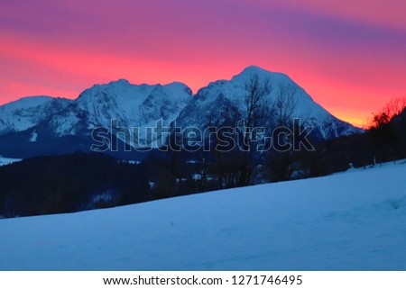 Sunrise and snowcapped mountains in Rossleithen (Austria)