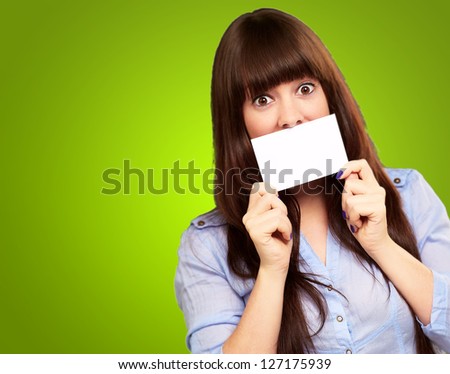 Woman Holding Blank Card Isolated On Green Background