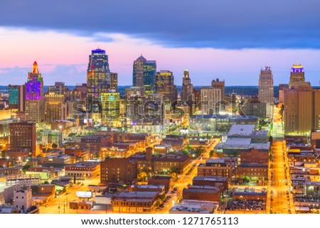 Kansas City, Missouri, USA downtown cityscape at twilight.