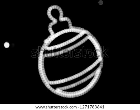 Christmas decorations, symbol made of bokeh garland, defocus