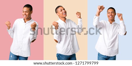 Set of Young african american man celebrating a victory in winner position