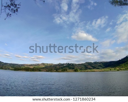 Mountain view blue sky and reservoir
background Space