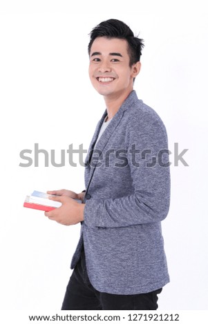 Asian man holding the book