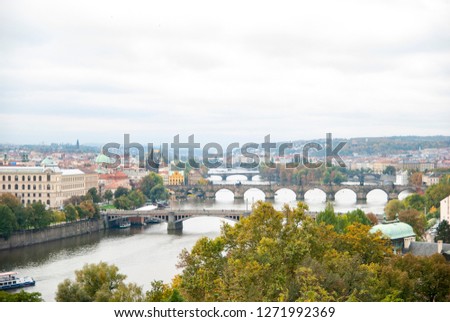 Prague, Czech Republic
Take a picture of the Charles Bridge and Old Town Bridge Tower in the background of the Vltava River. The bridges of Prague seem far away.