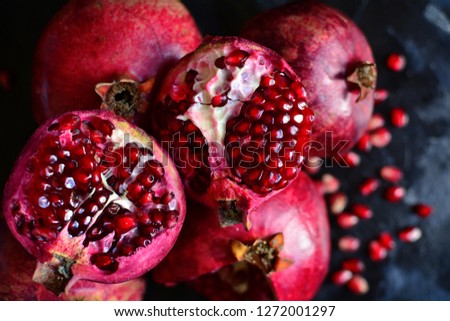 Healthy Pomegranate on Black Background