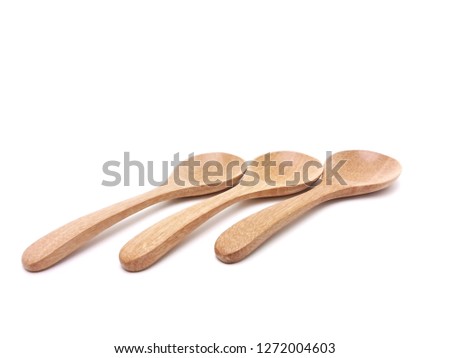 Three wooden spoon with blank space for text isolated on white background