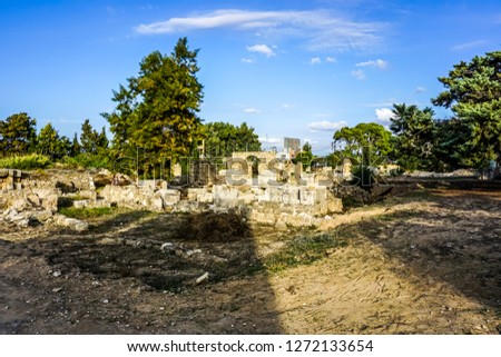 Tyre Hippodrome Ruins and Necropolis with Picturesque Blue Sky Background