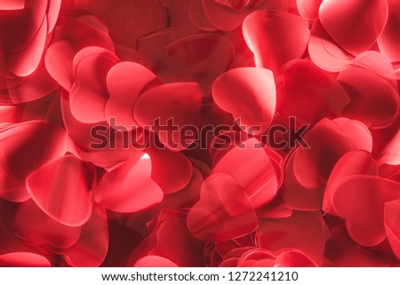 top view of decorative red heart shaped petals, valentines day background