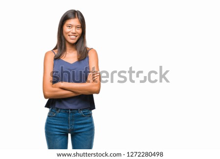 Young asian woman over isolated background happy face smiling with crossed arms looking at the camera. Positive person.