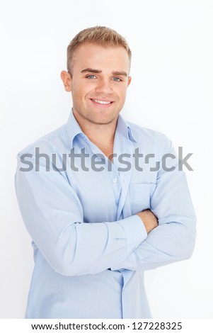 Portrait of happy smiling young businessman on white background