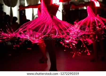 Glowing dress at the carnival
