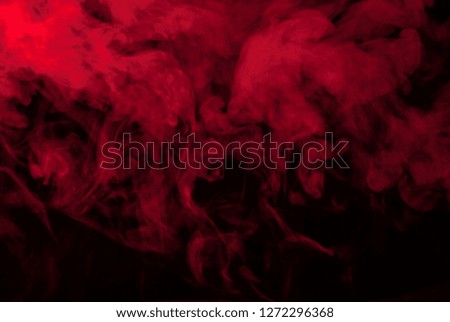 red smoke or steam on black for wallpapers and backgrounds