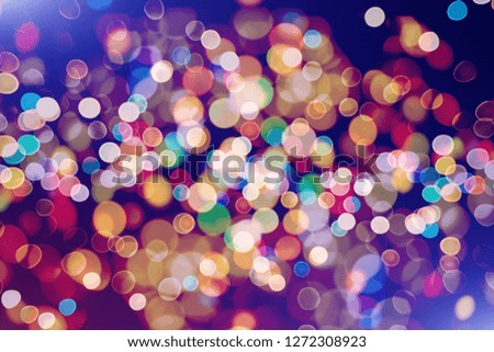 abstract blurred of blue and silver glittering shine bulbs lights background:blur of Christmas wallpaper decorations concept.xmas holiday festival backdrop:sparkle circle lit celebrations display .