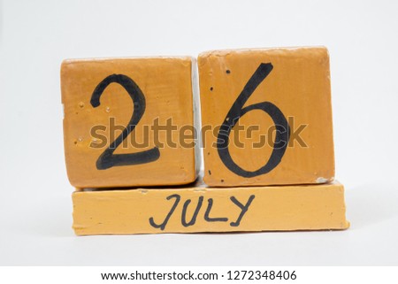 july 26th. Day 26 of month, handmade wood calendar isolated on white background. summer month, day of the year concept.