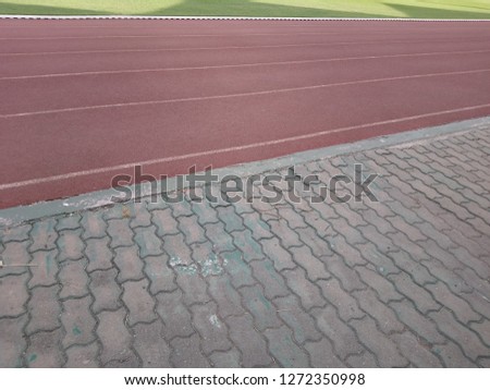 Running track and brick floor block