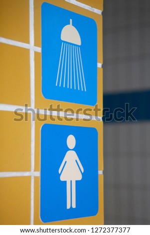 female shower icon Changing room in a public swimming pool